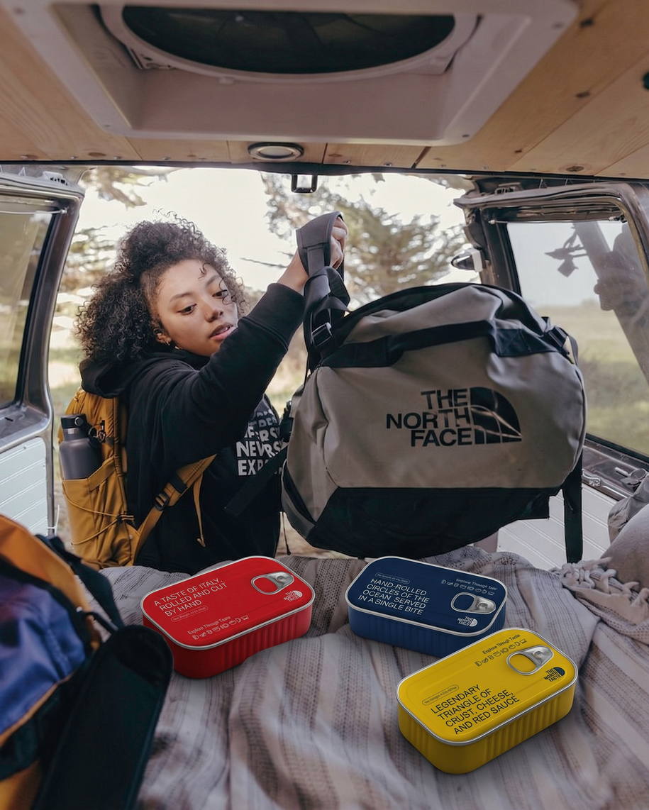 North Taste canned goods packed in a car trunk with outdoor gear